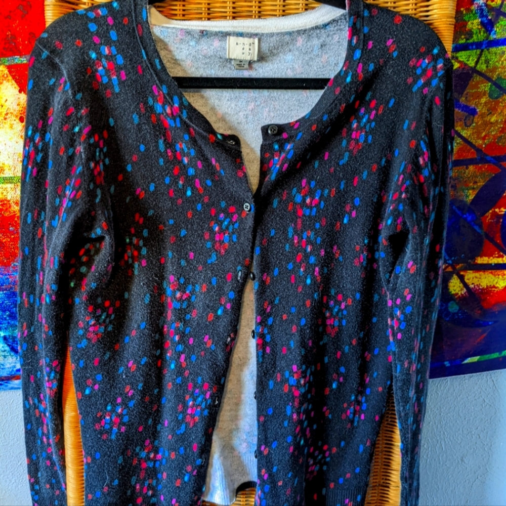 Black cardigan with pink and blush splashes